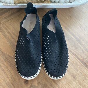 Black Perforated Slip-On Shoes. ILSE Jacobsen